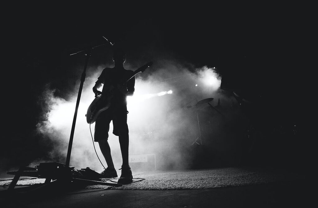 silhouette photo of guitarist rock music