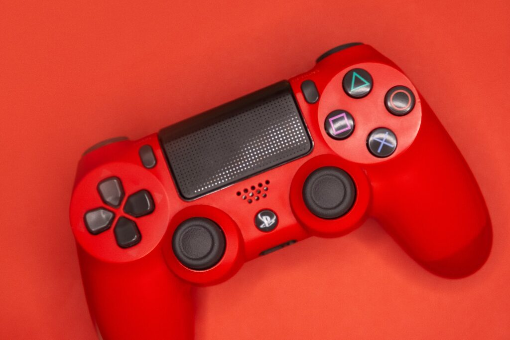 red and black sony ps 4 controller playstation