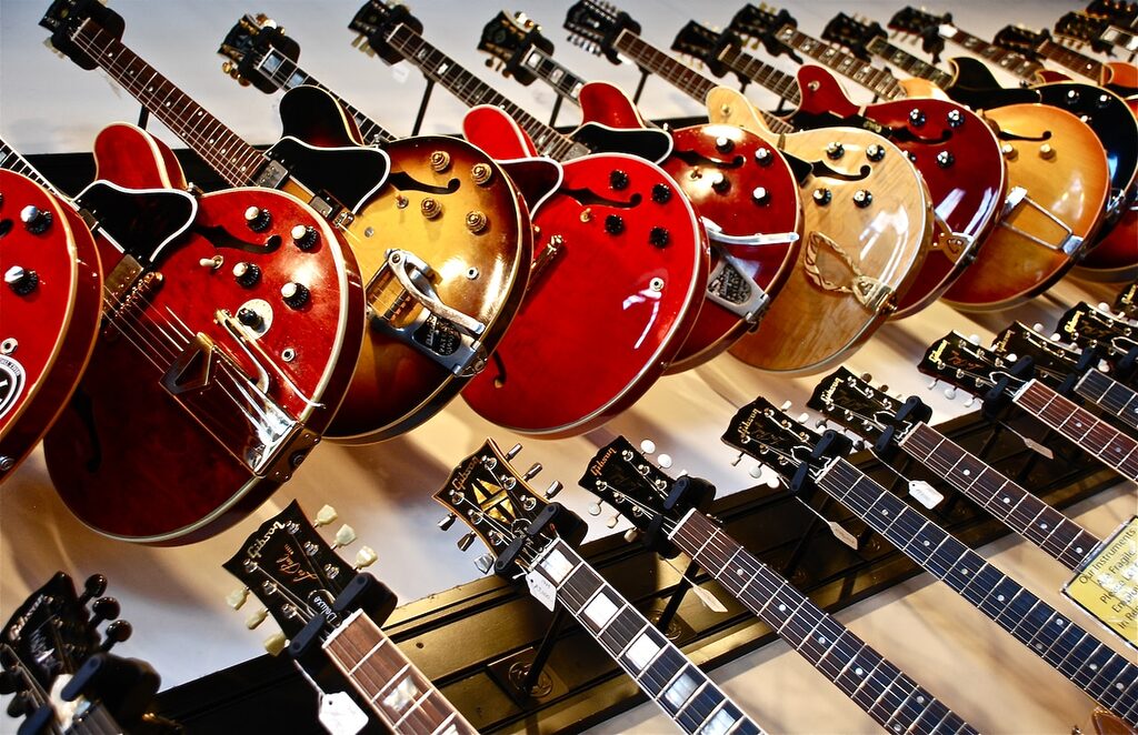 assorted-color jazz guitar guitars music instrument