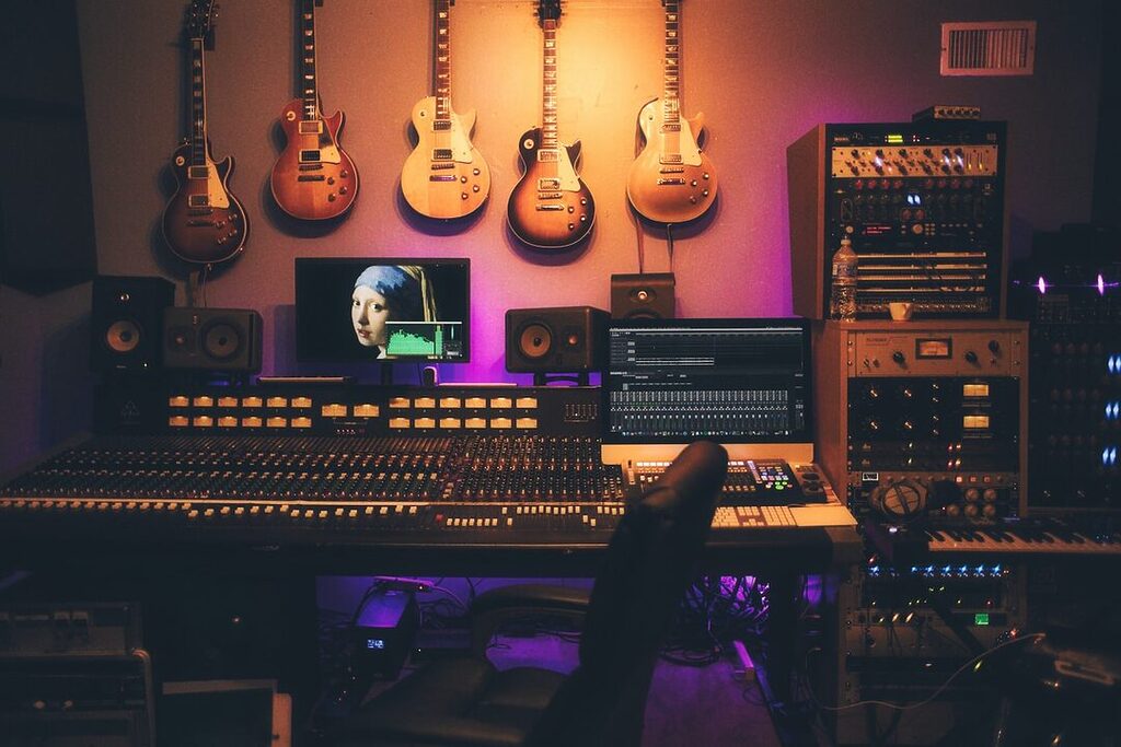 audio studio with guitars and mixing desk music